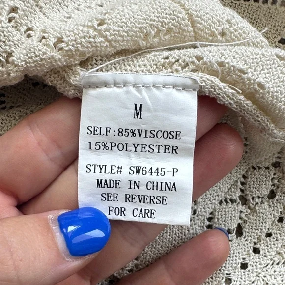 Chic Beige Knit Blouse with Bow Accents - Picture 3 of 14